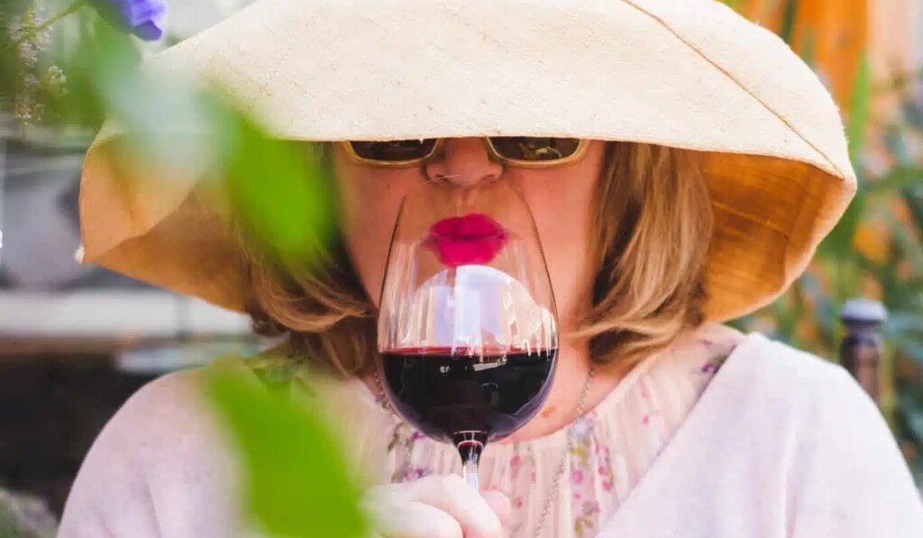 woman holding wine glass