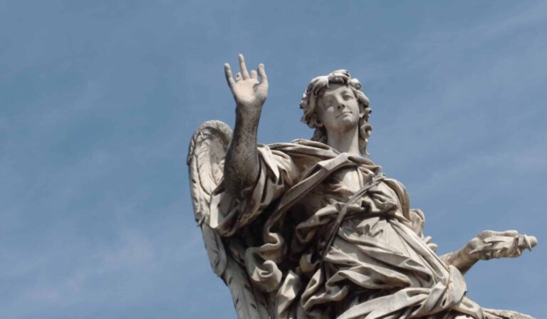 angel with right hand up statue